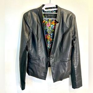 Black rivet faux leather jacket